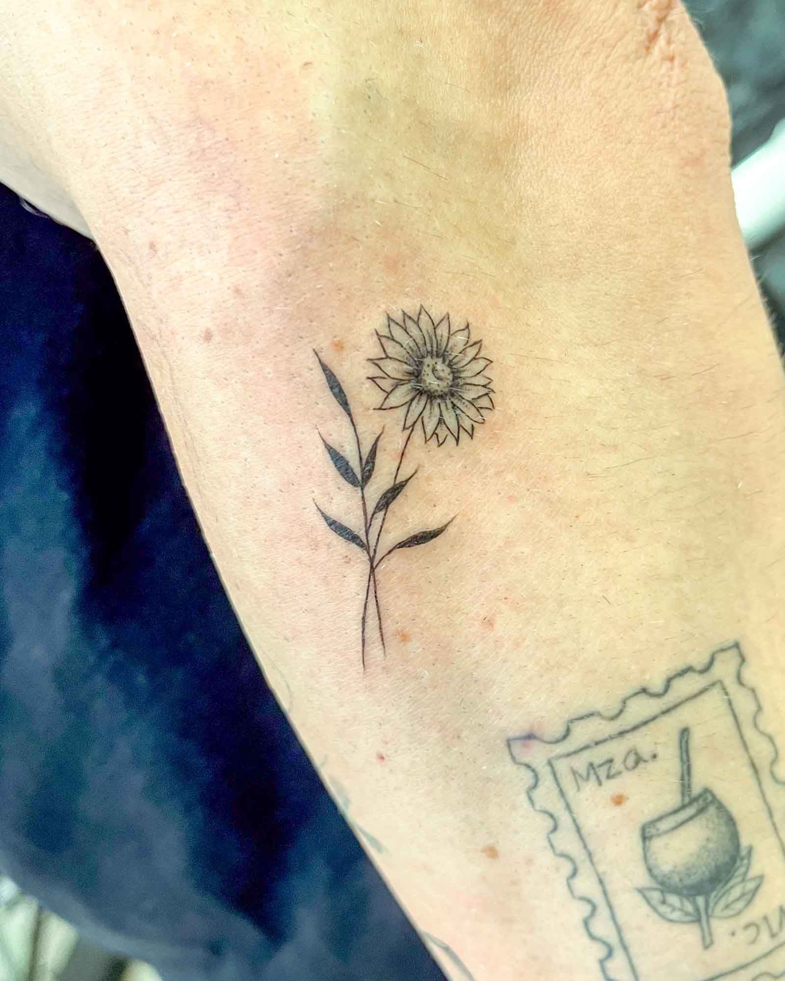 fine line flower tattoo valencia small minimalist floral tattoo delicate design