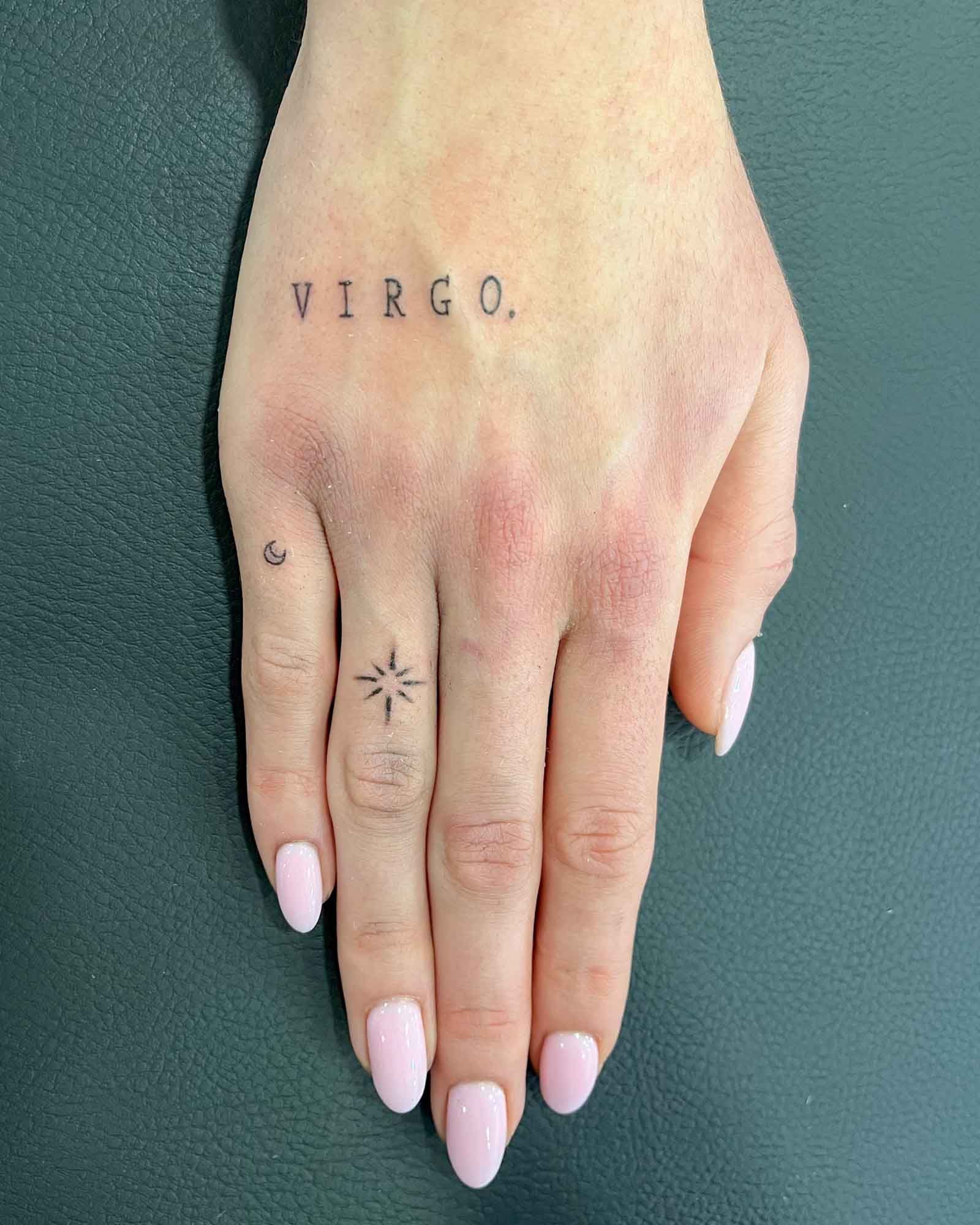 fine line hand tattoo lettering virgo typewriter moon stars valencia